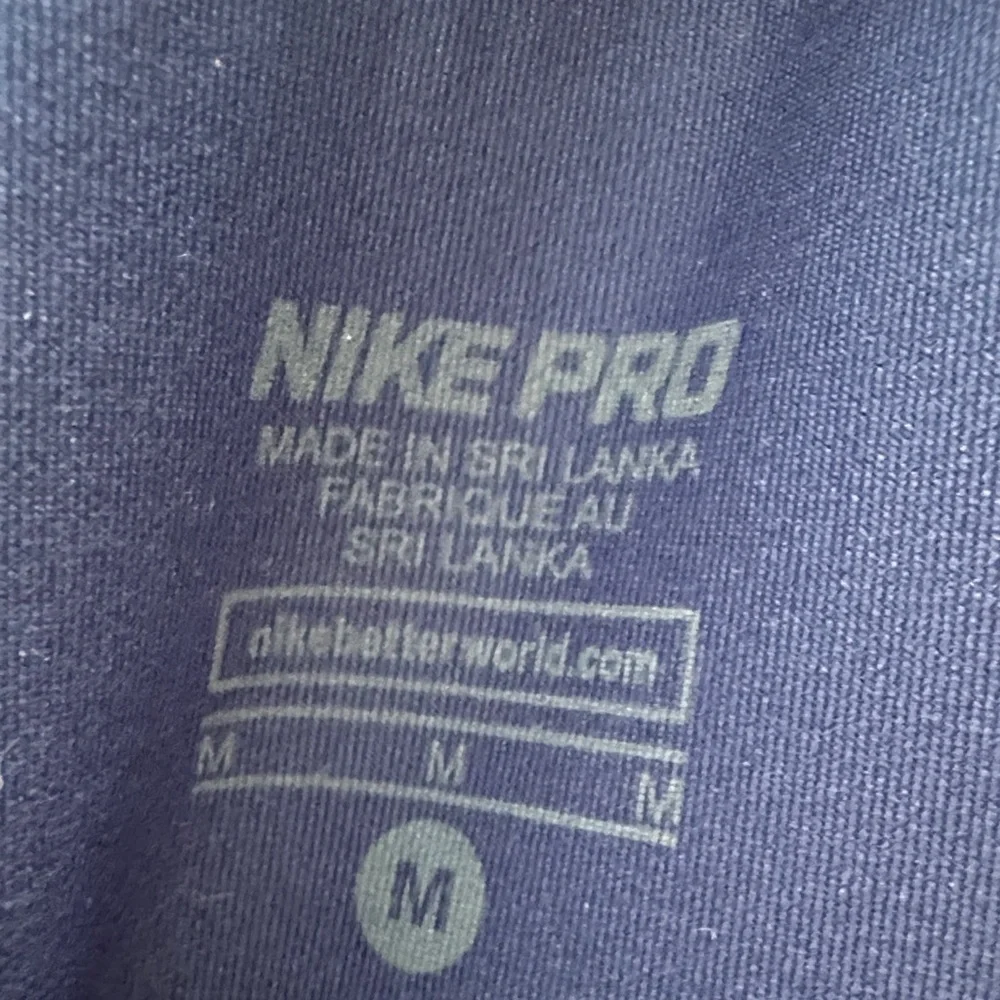 Nike ProbRoyal Blue Capri Leggings with White Swoosh